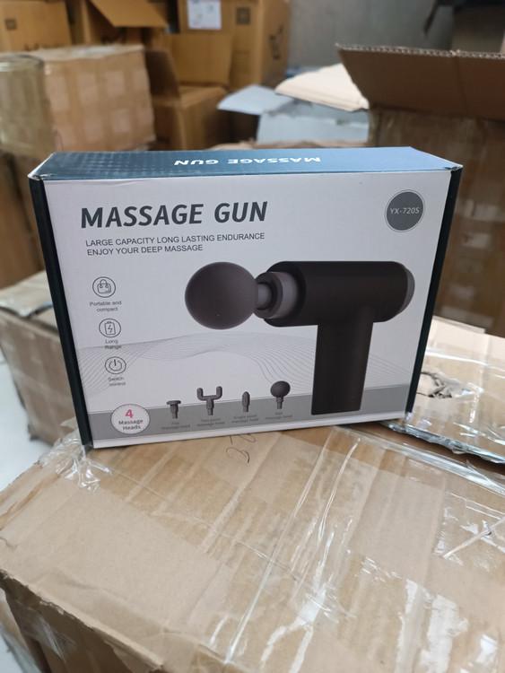 تصویر کارتن ماساژور گان داخل انبار